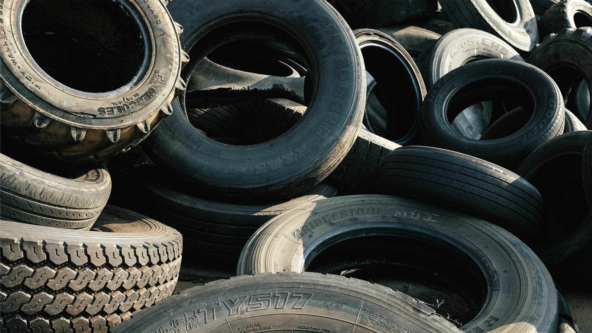 a pile of bald tires